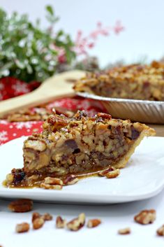 a slice of pecan pie on a white plate