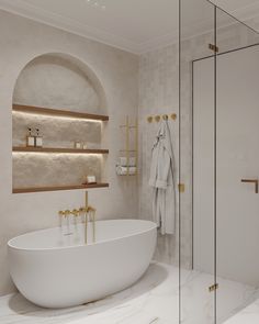 a white bath tub sitting next to a walk in shower