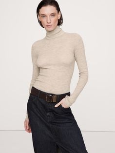 You can have it all.  This incredible cashmere sweater is knitted using a featherweight yarn that’s oh-so-soft—without sacrificing warmth—and just a little heavier than a t-shirt in weight.  Style it as a first layer through the coldest months and wear it as a luxe alternative to a t-shirt once the weather warms.  Semi-Sheer Fitted.  Good Cashmere Standard™: The cashmere for this product is produced according to the Good Cashmere Standard™, which aims to improve the welfare of the cashmere goats Support Local Farmers, Cashmere Yarn, Cashmere Turtleneck, Luxe Gifts, Support Local, Natural Resources, Luxury Gifts, Outerwear Sweater, Hip Length