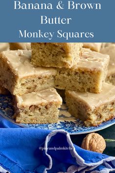 banana and brown butter monkey squares on a blue plate with walnuts in the background