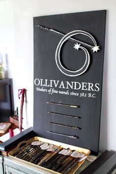 an old drawer is filled with jewelry and other items that are on display in the room