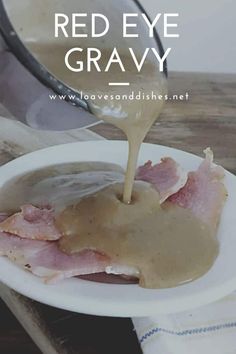 a person pouring gravy into a white plate with bacon on it and the words red eye gravy