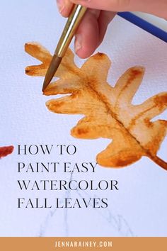 someone is painting leaves with watercolors and the words how to paint easy watercolor fall leaves