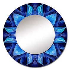 a circular mirror with an abstract blue flower design on the front and sides, reflecting light