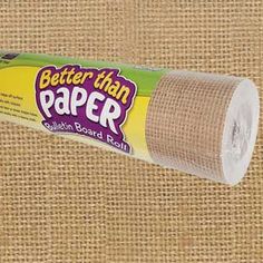 a roll of paper sitting on top of a burlocked surface with the words better than paper written on it