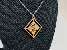 Look chic and stylish with our beautiful solid wood personalized Monogram Necklace. Monogram and Name necklaces are extremely popular and now you can wear your monogram with this beautiful Necklace - Choose from 7 choices of wood - Alder, Mahogany, Maple, Cherry, Walnut, Red Stained Maple, Black Stained Maple This monogrammed necklace is a perfect gift for yourself, family member, friend, or significant other for any special occasion, including birthdays, anniversaries and Christmas! Are you a b Monogram Wood Necklace, Create Monogram, Wood Monogram, Name Necklaces, Wood Personalized, Red Stain, Monogram Necklace, Black Stains, Personalized Monogram