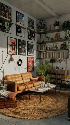 a living room filled with furniture and lots of pictures on the wall above it's coffee table