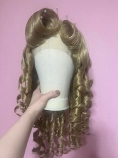 You can look just like a princess in this beautiful wig! This wig features a lace front style with a very natural, realistic hairline. It also features lots of gorgeous hair, adjustable straps for sizing, beautiful bangs, and bouncy curls. Wig can come in soft curls or tight curls, please reference last photo of the listing for the difference. Each wig is packed with care and shipped on a wig head. Bouncy Curls Wig, Ariana Grande Grammys, Curls Wig, Sleeping Princess, Wig Head, Wig Lace Front, Wig Styling, Tight Curls, Curl Styles