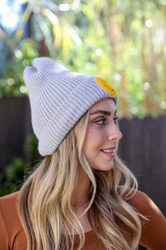 the Smiley Face Ribbed Beanie! This super cute and fun beanie is perfect for winter fashion. It's made of soft, ribbed fabric and features a classic smiley face design. It's sure to keep you warm and stylish all season long! #completeyourlook #lovemyleto Imported Smiley Face Design, Sorority Rush Dresses, Bachelorette Dress, Casual Bodysuit, Rush Dresses, Pink Olive, Bridal Shower Dress, Smiley Faces, Western Boho