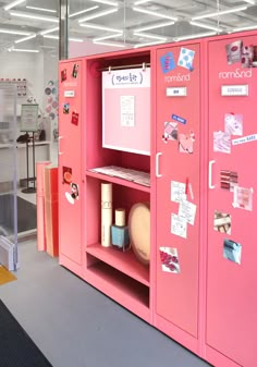 a pink locker with lots of magnets on it