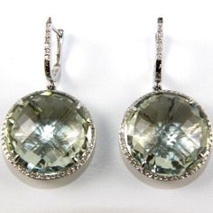 These Are Fine Round Green Amethyst & Diamond Drop Earrings. They Are Made Of 100% Natural 14kt White Gold And Are In Brand New Condition. They Have A Ctw Of .92ct And Weighs 12.5 Grams. The Diamonds Have Si2 Clarity And G Color. Here We See A Beautiful Pair Of Round Cut Green Amethyst Gemstones Surrounded By Diamond Accents These Earrings Have Designer Qualities That Are Full Shine And Clarity And Fasten By Snap Back. Samson Diamond 100% Authentic Natural Diamonds, Gemstones, And Gold. Green Amethyst, Snap Backs, Diamond Drop Earrings, Amethyst Gemstone, Natural Diamonds, Round Cut, Diamond Earrings, Amethyst, Jewelry Earrings