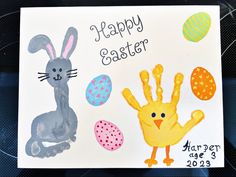 a happy easter card with an image of a bunny, rabbit and eggs on it