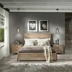 a bed room with a neatly made bed and two pictures on the wall above it