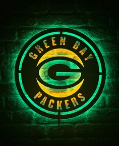 the green bay packers neon sign is lit up