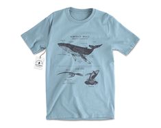 "Wildlife anatomical design of the humpback whale that's pressed with hand-mixed inks onto a velvety smooth cotton shirt. The shirt is twined and tagged giving a vintage nautical presentation. Makes a thoughtful gift for any whale enthusiast in your life. T-shirt stats: * 100% ringspun cotton * Unisex sizing * Shoulder taping * Side-seamed * Pre-shrunk All shirts are silk-screened here in the Life Shines workshop and because of the handmade nature, each t-shirt has a different \"personality\". A Whale Anatomy, Biology Shirt, Anatomy Design, Whale Artwork, Whale Gift, Whale Shirt, Marine Biologist, Humpback Whale, Star Shirt