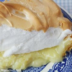 a blue and white plate topped with dessert