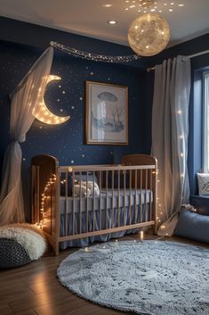 a baby's room decorated in blue and white with lights on the ceiling, crib