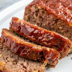 meatloaf with ketchup on a cutting board