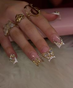 Really detail nails with gold and white butterflies in golden