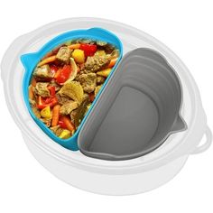 the bowl is filled with food and has it's lid open to reveal its contents