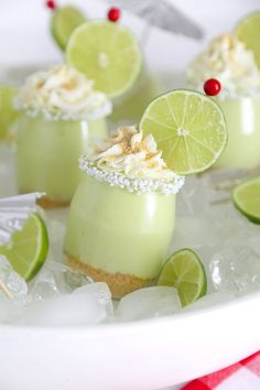 small desserts with limeade and whipped cream on top, garnished with sprinkles