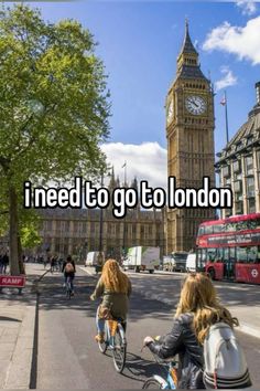 two girls riding bicycles down the street in london with big ben in the background and i need to go to london