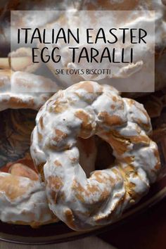 an egg tarail bagel on a plate with the title overlay reads italian easter egg tarail she loves biscotti