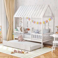 a child's bedroom with a white bed and toy house on the floor next to it