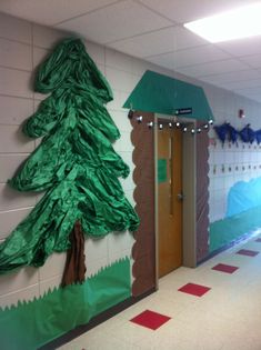 a hallway decorated with paper plates and trees