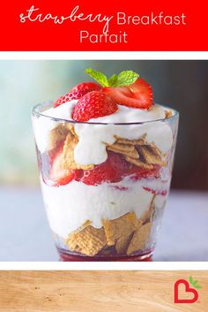 strawberry breakfast parfait in a glass with strawberries on top and the title overlay reads strawberry breakfast parfait