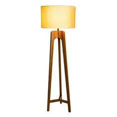 a wooden floor lamp with a white shade