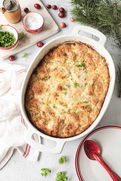 a casserole dish with cheese and herbs