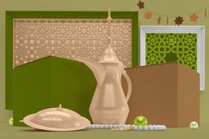 an assortment of kitchen items displayed in front of a green wall with decorative ornaments on it