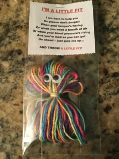 a package of yarn with a poem written on it