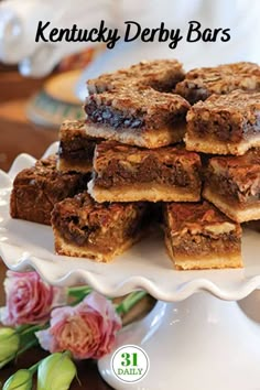 a white plate topped with lots of brownies