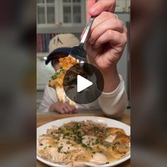 a person is eating food with a knife