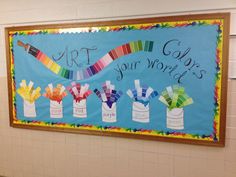 a classroom bulletin board with different colors and writing on it