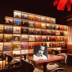 a restaurant with many pictures on the wall