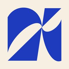 a blue and white logo with the letter k on it