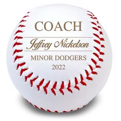 a white and red baseball with the coach on it's side, which reads jeffy nickleson minor dodgers