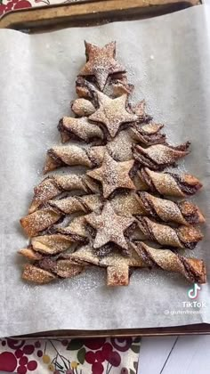 a small christmas tree made out of cookies