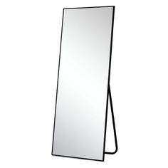 a mirror that is standing up against a white wall and has a black frame on it