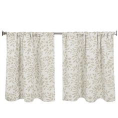 two curtains with leaves on them hanging from a rod - end curtain in front of a white background