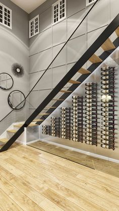 there is a wine rack under the stairs