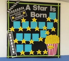 a star is born bulletin board with popcorn and movie claps on the front wall