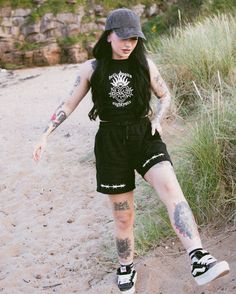 HELL AWAITS ⚔️ We are still overwhelmed by how well received this set has been over the summer! For those waiting on a women’s shorts restock, fear not! We have some newness dropping very soon & we can’t wait to see you all style it 🫶🏻 Goth Camping Outfit, Goths In Summer, Dark Outfits Summer, Adult Summer Outfits, Goth Shorts Outfits, Grunge Shorts Outfit, Summer 2025 Outfits, Goth Summer Outfits, Summer Goth Outfits