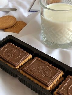 some cookies and milk on a table