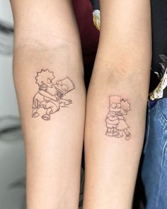 two people with matching tattoos on their arms