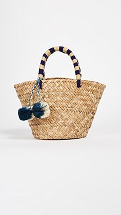 Kayu Mini St Tropez Tote | Fall Fashion Dresses, Diy Fashion Accessories, St Tropez, I Can't Wait, Knitted Bags, Pom Poms, Small Bags, Straw Bag