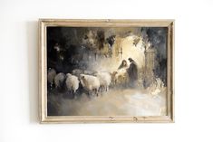 a painting hanging on the wall next to a white wall with two sheep in it